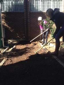 WE employees gardening on Mandela Day
