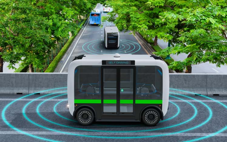 Mock up of self driving cars navigating a street - Technology Communications