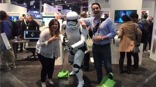 two enthusiastic CES attendees with starwars stormtrooper